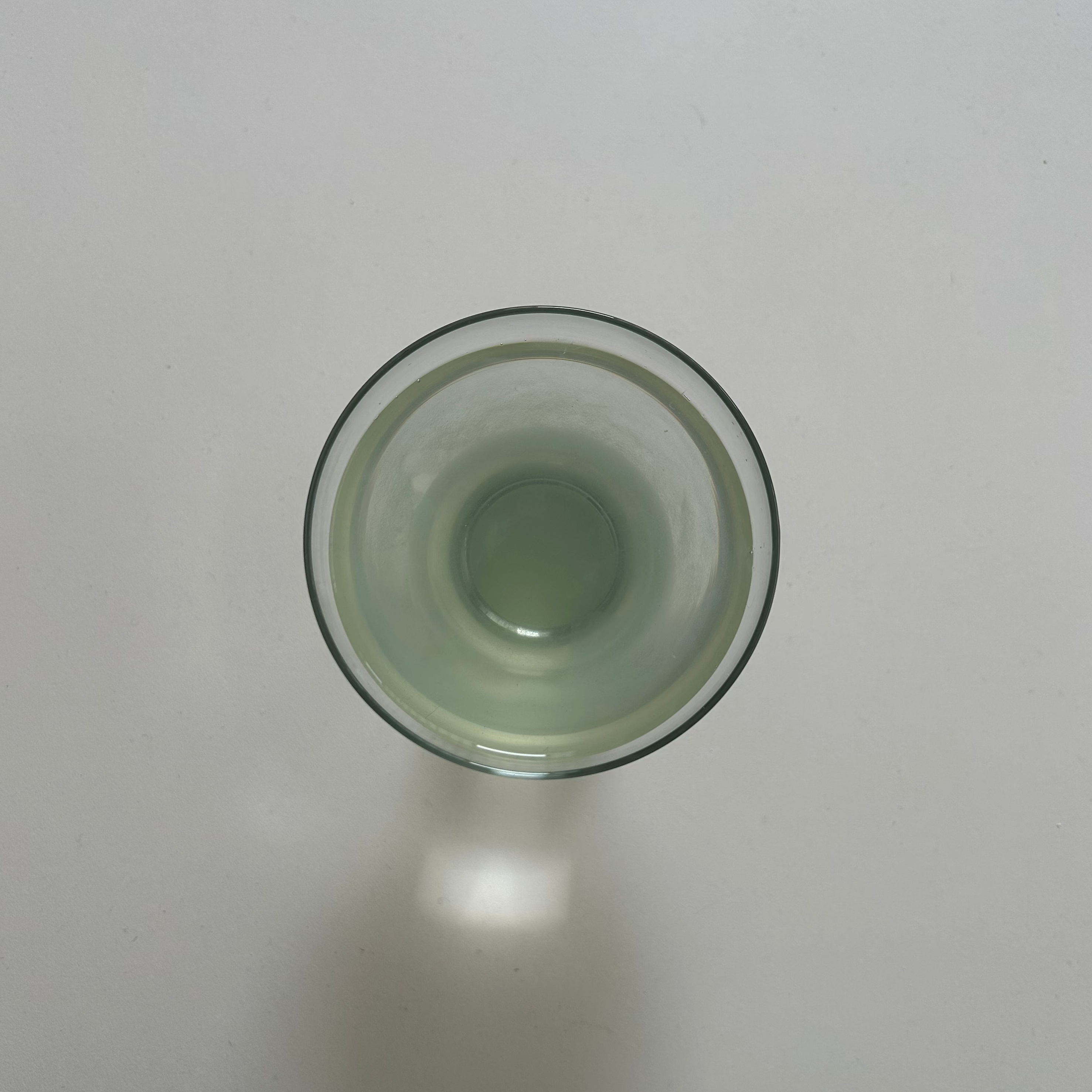 Clear glass cup on a white background