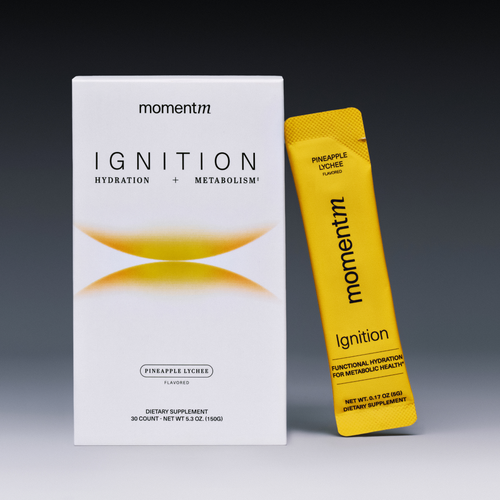 momentm Ignition hydration and metabolism supplement packaging on a gradient background